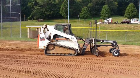 skid steer grading youtube